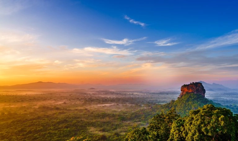Sunrise view to Sigiriya rock – Lion Rock – from Pidurangala Rock in Sri Lanka